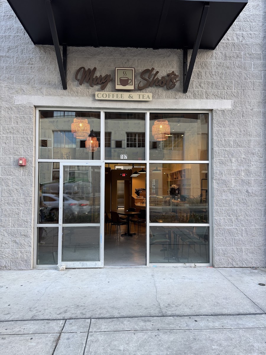 Mug Shots storefront on West Gaines Street